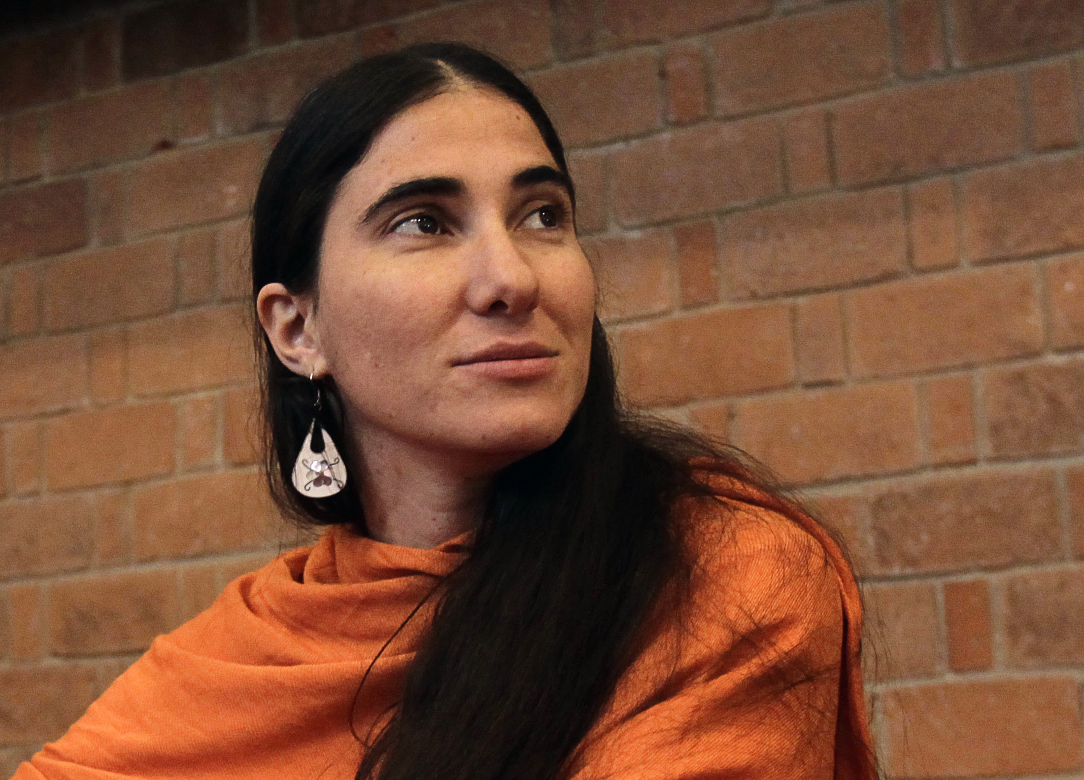 Cuba's best-known dissident blogger Yoani Sanchez listens to a question after she delivered a speech to students of the Iberoamericana University in Mexico City