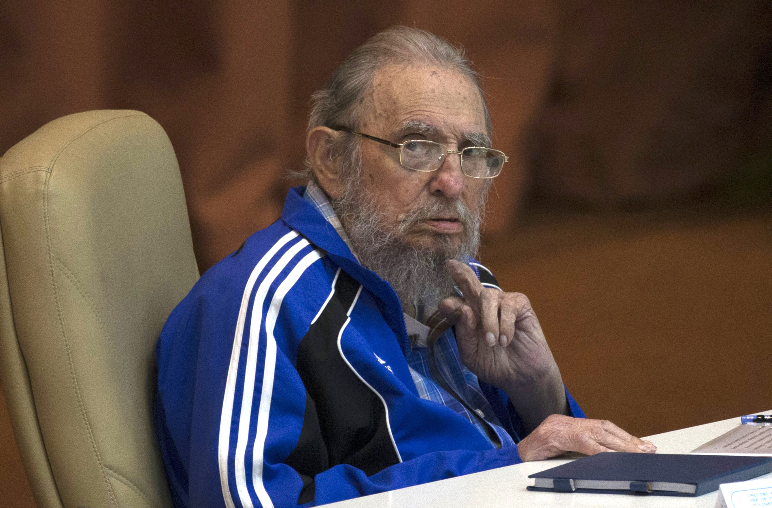 FILE - In this April 19, 2016 file photo, Fidel Castro attends the last day of the 7th Cuban Communist Party Congress in Havana, Cuba. Fidel Castro formally stepped down in 2008 after suffering gastrointestinal ailments and public appearances have been increasingly unusual in recent years. Cuban President Raul Castro has announced the death of his brother Fidel Castro at age 90 on Cuban state media on Friday, Nov. 25, 2016. (Ismael Francisco/Cubadebate via AP, File)